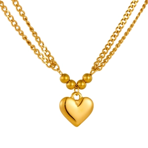 Double-layered gold stainless steel necklace featuring a heart pendant and beads