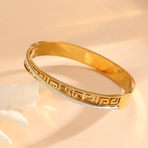 Luxury gold-plated titanium steel bracelet with Greek key cutout and diamond side setting