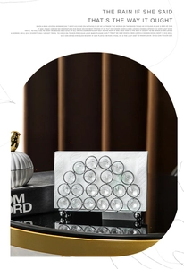 Detail of luxury crystal napkin holder with silver metal rings and glass beads