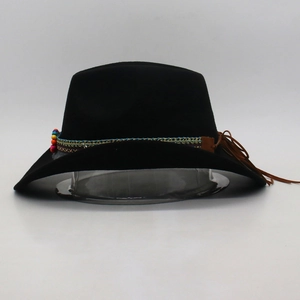 Detail of black felt fedora featuring bohemian braided band with beads and leather tassels