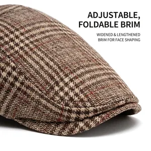Brown houndstooth newsboy cap with adjustable curved wide brim for a retro autumn style