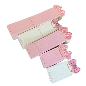 Pink and white paper accessory cards with bow knots for earrings and necklace packaging