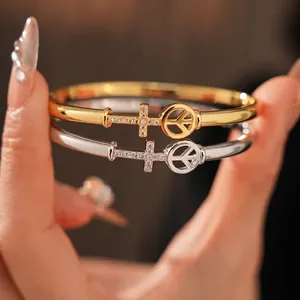 Gold and silver plated arrow cross cuff bracelets with peace sign and zircon inlay