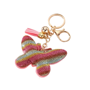 Sparkling pink butterfly keychain with colorful rhinestones, gold ring and fringe tassel
