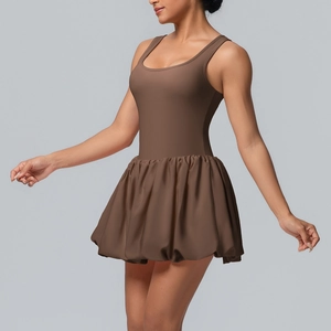 Close-up of deep brown sleeveless sports dress with gathered puff hem and racerback
