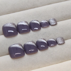 Cat eye glitter press-on toenails in deep purple with shimmering silver gradient effect