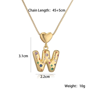 Detailed view of gold 18K letter W balloon pendant necklace with colorful zircons