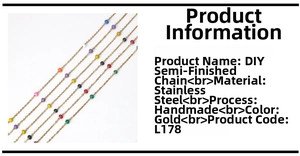 Detailed macro view of handmade gold stainless steel chain with colorful bead accents