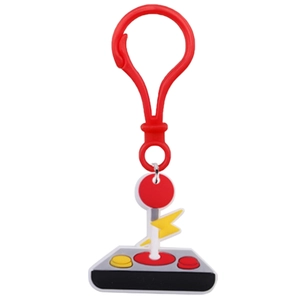 Detail of cartoon game controller keychain with red plastic carabiner and soft rubber pendant