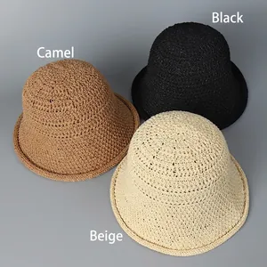 Minimalist knitted bucket hats in camel, black, and beige colors for stylish women