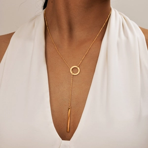 Elegant gold minimalist Y-lariat necklace with vertical bar pendant and circle link