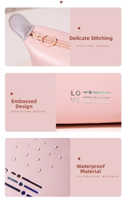 Macro detail of pink waterproof PU makeup bag with LOVE logo and metal ring zipper
