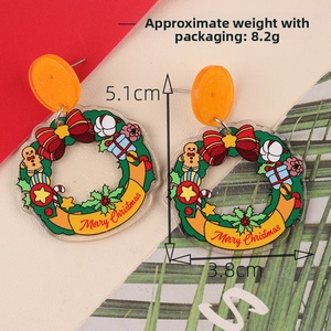 Detailed view of Christmas wreath earrings with Merry Christmas text and 5.1cm size markings