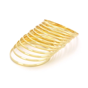 Set of 12 minimalist 3.6mm polished 18k gold stackable stainless steel bangles
