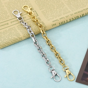 Detail of dual lobster clasps on stainless steel O-chain in gold and silver finish
