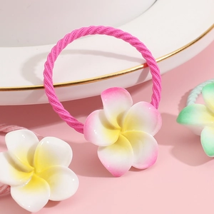 Elastic kids hair tie with vibrant pink frangipani flower and rose red rubber band
