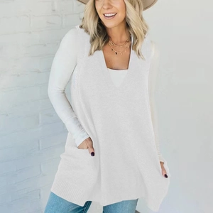 Women's white knitted V-neck vest sweater with side pockets in a loose fit