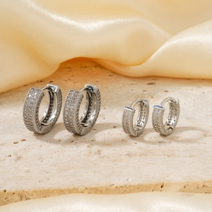 Sparkling zircon encrusted silver hoop earrings set in large and small sizes for women