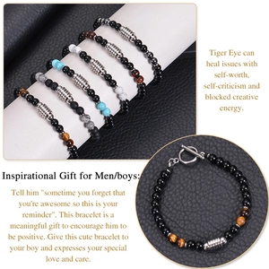 Detail of beaded bracelets with natural tiger eye and obsidian stones featuring OT clasp