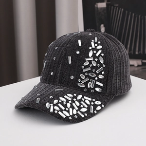 Detailed close-up of velvet texture and sparkling rhinestones on this luxury black baseball cap