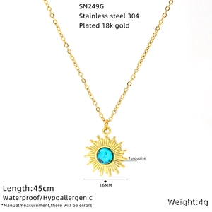 Macro detail of sunflower pendant with turquoise inlay on 18k gold plated chain
