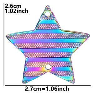 Macro detail of rainbow star charm with 2.6cm dimensions and textured finish