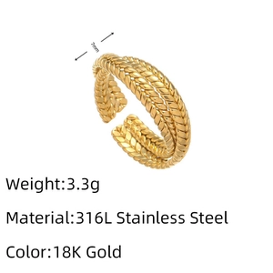 Detailed macro view of 7mm braided texture on 18K gold plated stainless steel ring