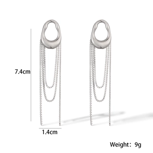 Detail view of silver tassel earrings with measurements 7.4cm length and 9g weight