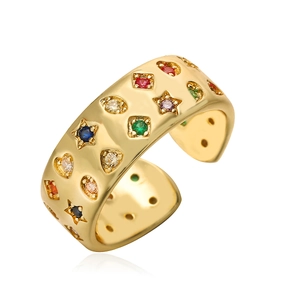 Wide gold open ring with colorful multi-shape zircons on a clean white background