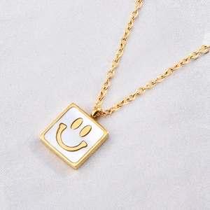 Elegant 18K gold-plated titanium steel necklace featuring a square yellow smiley pendant