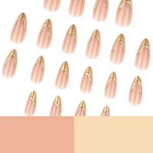 French style almond false nails with gold tips and vertical stripes in nude pink base
