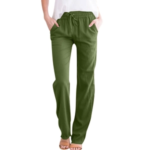 Detail of army green cotton linen trousers showing drawstring waist and side pockets
