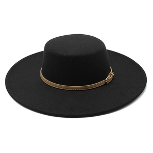 Detail of black boater hat with flat top, khaki leather band and gold buckle detail