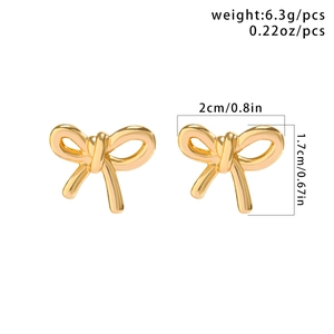 Detailed size specifications of gold bow earrings showing 2cm by 1.7cm dimensions