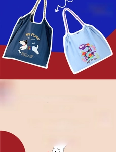 Close-up of embroidered nylon tote bags featuring blue and white towel embroidery details