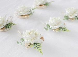Detailed set of 6 white artificial rose boutonnieres with gold leaves and ribbons