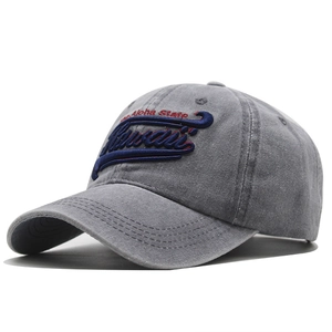 Detail of grey washed cotton baseball cap with Hawaii embroidery and vintage curved brim