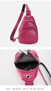 Detail view of pink PU leather chest bag with litchi texture and interior compartment