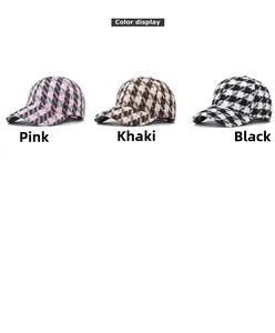 Three color variants of thick houndstooth plaid baseball caps in pink, khaki, and black