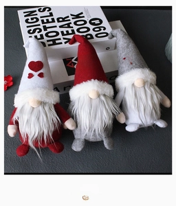 Three Christmas gnomes featuring heart, star, and snowflake patterns on their hats