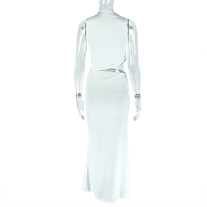 Detail view of the back cutout design on this sleek white slim fit maxi dress for women
