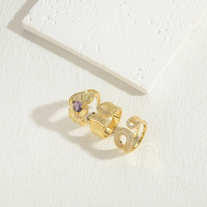 Luxurious 14K gold plated rings with purple zircon and pave diamonds on stone