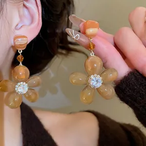 Elegant amber resin flower dangle earrings with cubic zirconia inlay and silver pins