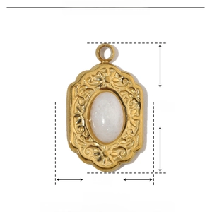 Detail view of oval white stone pendant with golden stainless steel frame and measurements