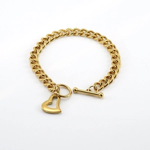Polished 18K gold-plated stainless steel Cuban link bracelet with OT clasp and heart charm