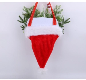 Detail of hanging Christmas hat ornament with pine needles and red berries decoration