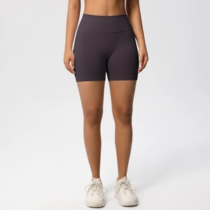 Front view of high-waist seamless compression fitness shorts in deep purple fabric
