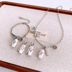Elegant bear jewelry set with zircon heart necklace, bracelet, and earrings for women