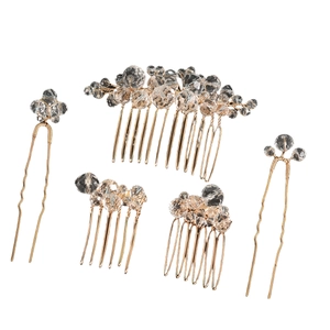 Golden bridal hair accessories set with champagne crystal beads and floral combs