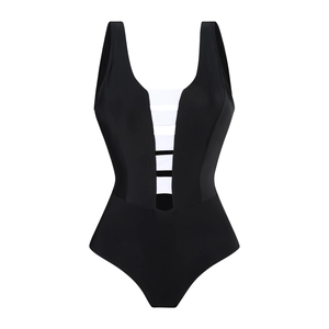 Detail view of the black one-piece swimsuit with white striped cutout and wide straps